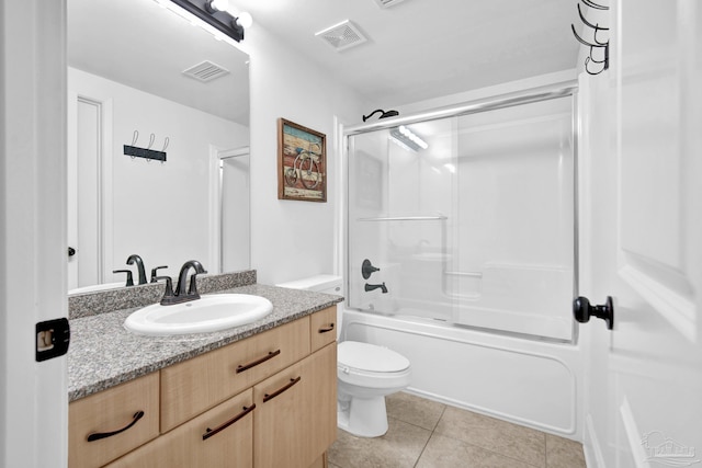 full bath with visible vents, vanity, toilet, and tile patterned floors