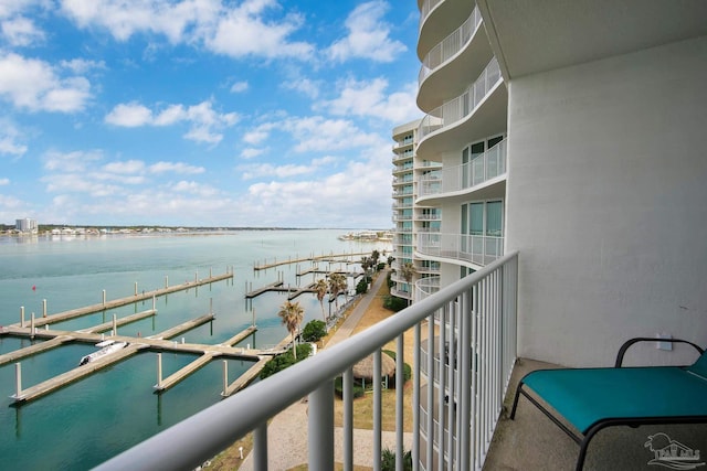 balcony featuring a water view