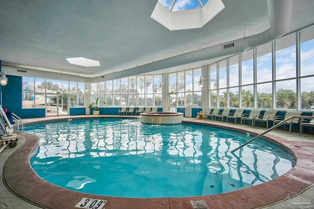 community pool featuring a skylight