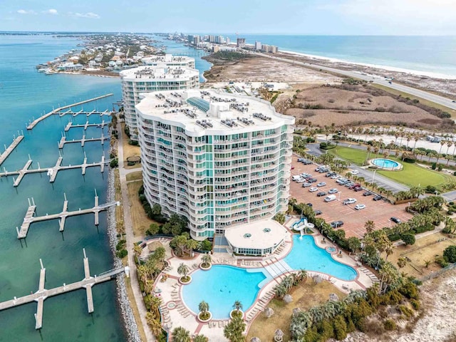 birds eye view of property with a water view