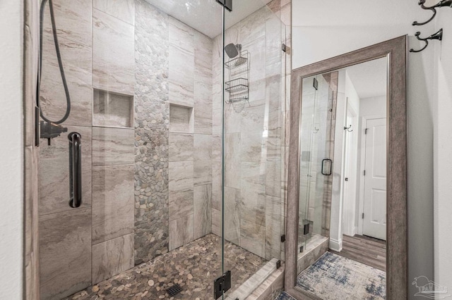 bathroom with a stall shower