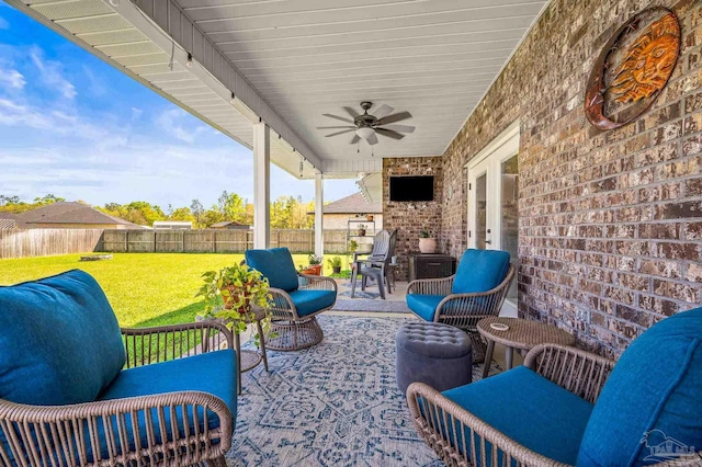 view of patio / terrace with a fenced backyard, an outdoor hangout area, and ceiling fan