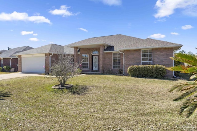 ranch-style house with a garage, driveway, a shingled roof, brick siding, and a front yard