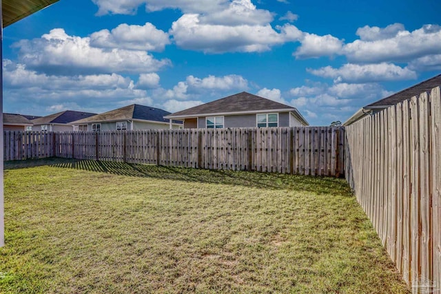 view of yard featuring a fenced backyard