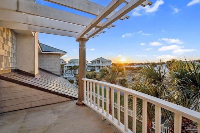 balcony featuring a pergola