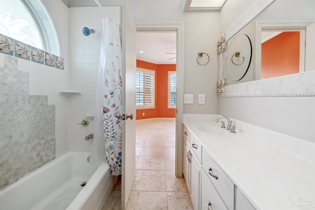 bathroom with crown molding, vanity, and shower / tub combo