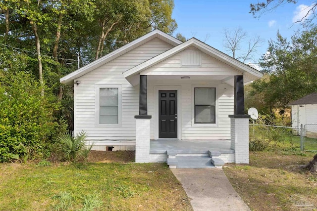 bungalow with a front lawn