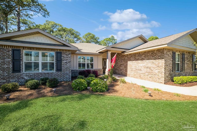 1521 Portside Dr, Gulf Breeze, FL 32563 - ranch-style home featuring a front lawn and brick siding