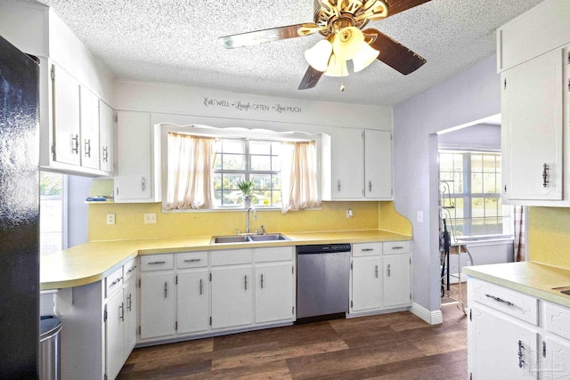 941 Summer Shade Ln, Cantonment, FL 32533 - kitchen with dishwasher, a sink, ceiling fan, dark wood-style flooring, and light countertops