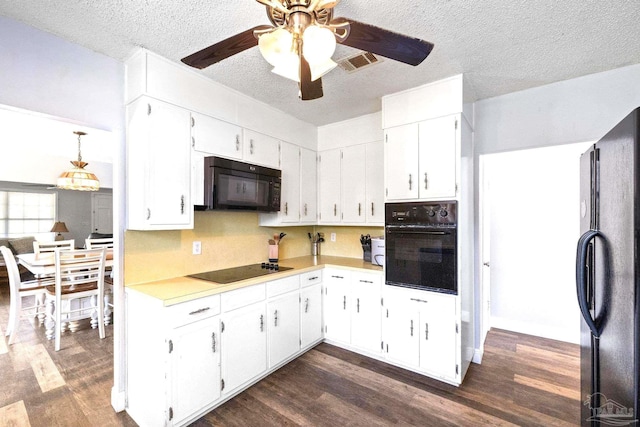 941 Summer Shade Ln, Cantonment, FL 32533 - kitchen featuring black appliances, a textured ceiling, dark wood-style flooring, light countertops, and ceiling fan