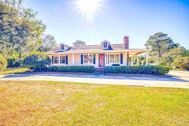 view of front facade with a porch and a front yard