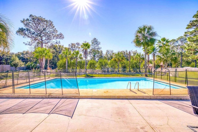 941 Summer Shade Ln, Cantonment, FL 32533 - view of pool featuring a patio area and view of scattered trees