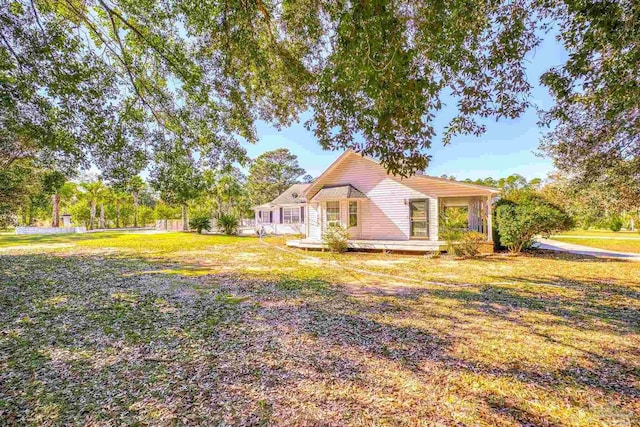 941 Summer Shade Ln, Cantonment, FL 32533 - view of front of house featuring a front lawn