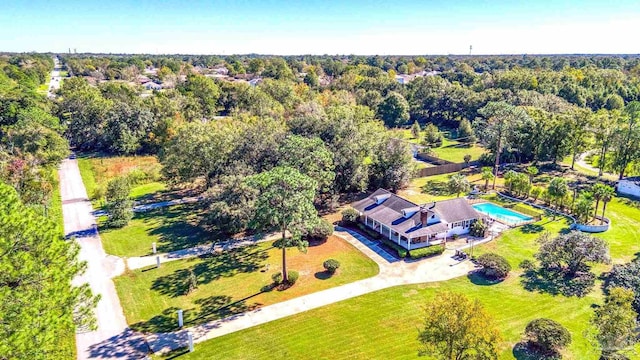 941 Summer Shade Ln, Cantonment, FL 32533 - view of subject property featuring a pool area and a forest
