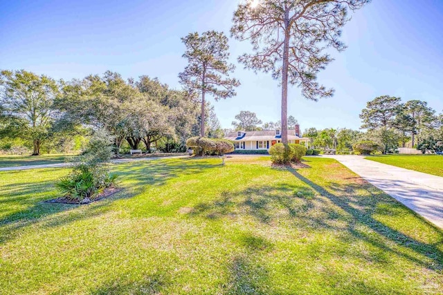 941 Summer Shade Ln, Cantonment, FL 32533 - ranch-style home with a front lawn and driveway