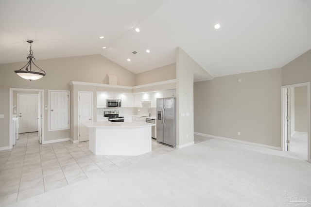 3200 Silverleaf Dr, Pensacola, FL 32504 - kitchen with appliances with stainless steel finishes, a center island, light countertops, a sink, and baseboards