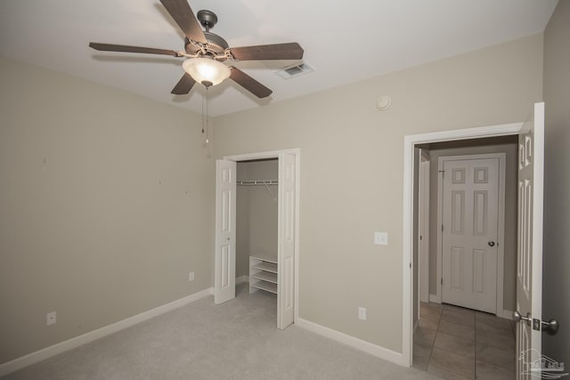 3200 Silverleaf Dr, Pensacola, FL 32504 - unfurnished bedroom with baseboards, a closet, a ceiling fan, and light colored carpet