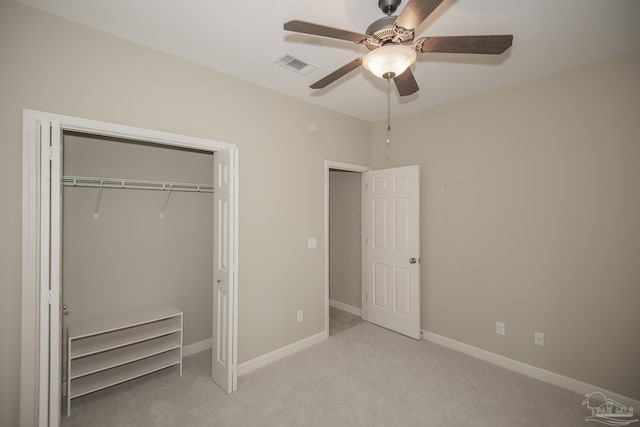 3200 Silverleaf Dr, Pensacola, FL 32504 - unfurnished bedroom featuring a closet, light carpet, ceiling fan, and baseboards