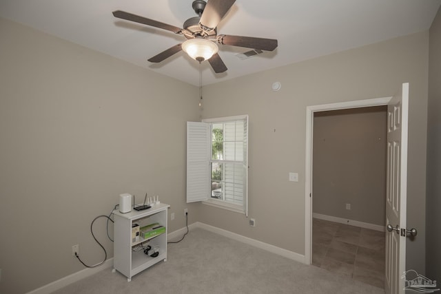 3200 Silverleaf Dr, Pensacola, FL 32504 - unfurnished bedroom featuring baseboards, ceiling fan, and light colored carpet