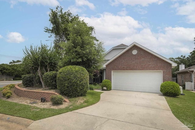 3200 Silverleaf Dr, Pensacola, FL 32504 - view of front facade featuring brick siding, concrete driveway, and an attached garage