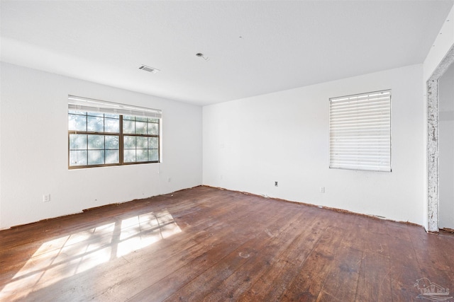 spare room featuring hardwood / wood-style flooring