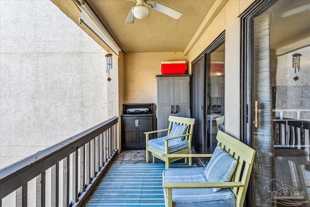 balcony with a ceiling fan