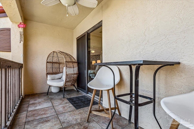 balcony with a ceiling fan