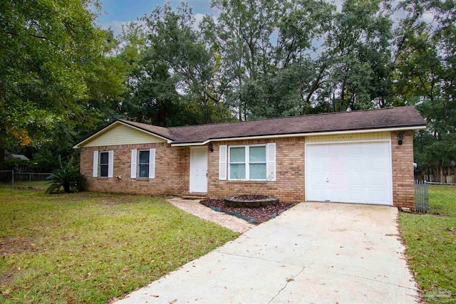 ranch-style home featuring a garage and a front lawn