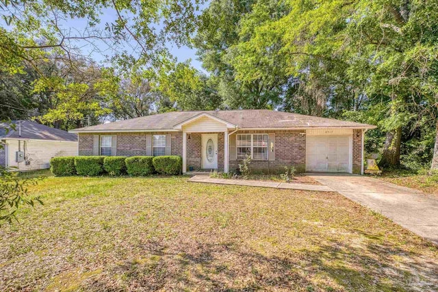 ranch-style home featuring an attached garage, brick siding, driveway, and a front yard