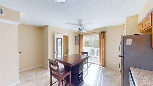 dining room with ceiling fan