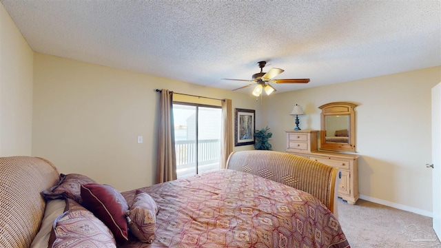 bedroom with ceiling fan, light colored carpet, a textured ceiling, and access to outside