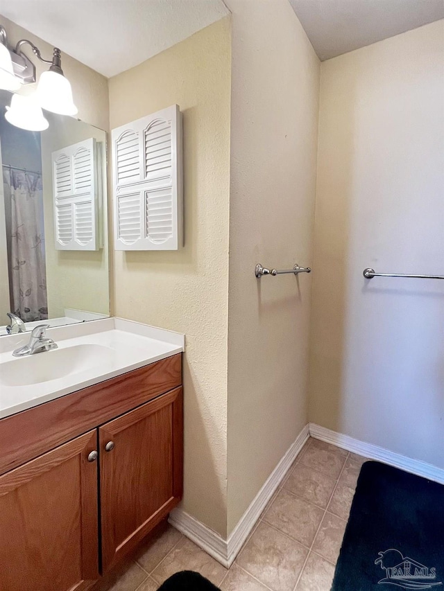 bathroom featuring vanity and tile patterned floors