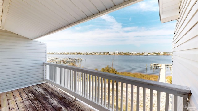 balcony featuring a water view