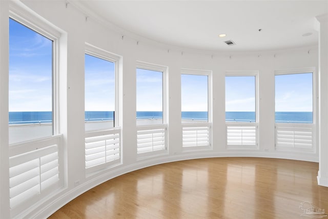 13555 Sandy Key Dr Ph, Ph, Perdido Key, FL 32507 - unfurnished sunroom featuring visible vents, a water view, and a healthy amount of sunlight