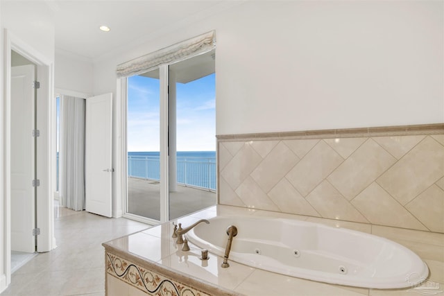 13555 Sandy Key Dr Ph, Ph, Perdido Key, FL 32507 - bathroom featuring a tub with jets, a water view, ornamental molding, and tile patterned floors