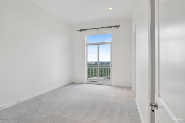 13555 Sandy Key Dr Ph, Ph, Perdido Key, FL 32507 - spare room featuring crown molding, light colored carpet, and baseboards