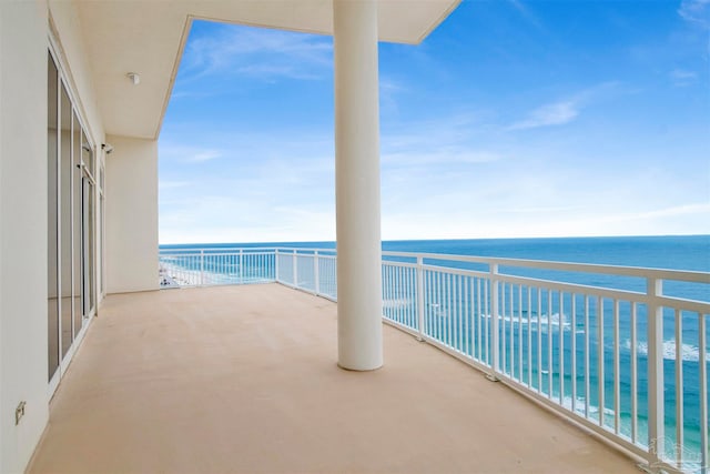 balcony featuring a water view