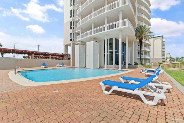 13555 Sandy Key Dr Ph, Ph, Perdido Key, FL 32507 - pool featuring fence and a patio area