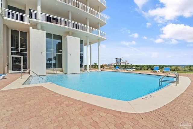 13555 Sandy Key Dr Ph, Ph, Perdido Key, FL 32507 - community pool featuring a patio area