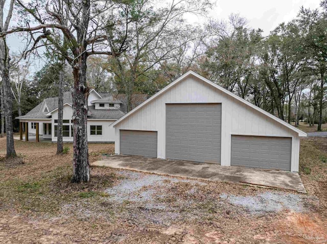 view of front of home with an outbuilding and a garage