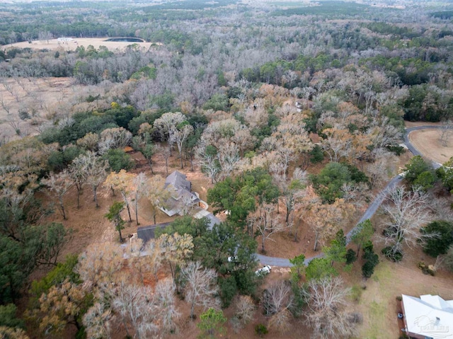 drone / aerial view with a view of trees