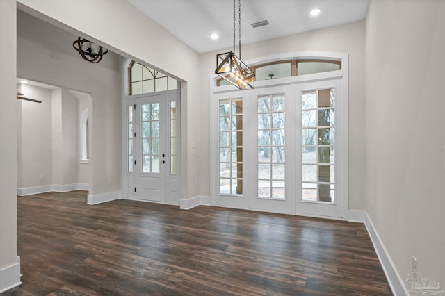 entryway featuring recessed lighting, visible vents, baseboards, and dark wood finished floors