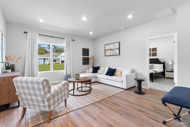 4704 Eider Rd, Pace, FL 32571 - living area featuring wood finished floors, recessed lighting, and baseboards