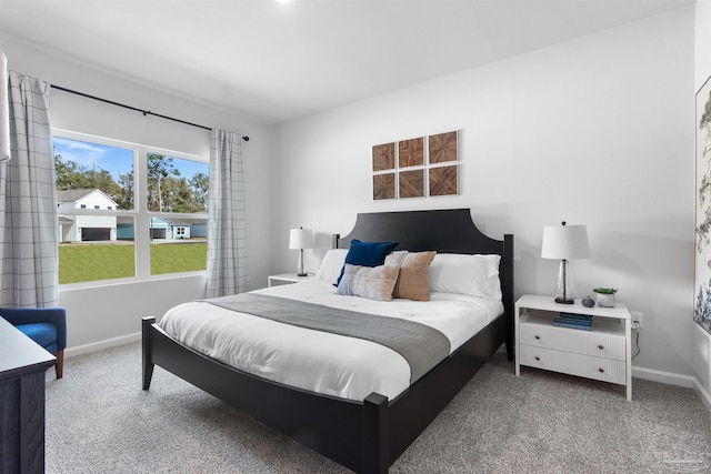 4704 Eider Rd, Pace, FL 32571 - bedroom with baseboards and carpet