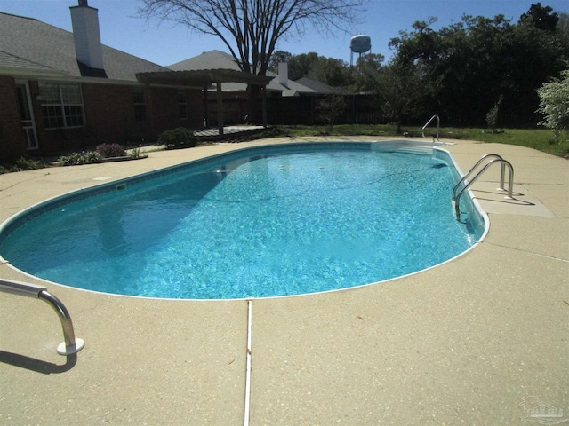 pool with a patio