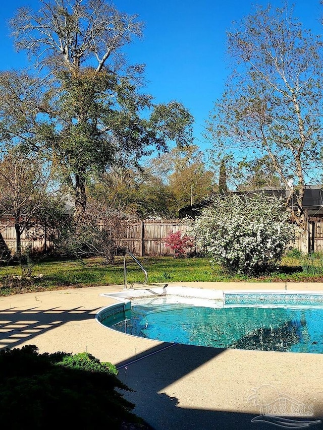 view of pool featuring a fenced in pool and fence