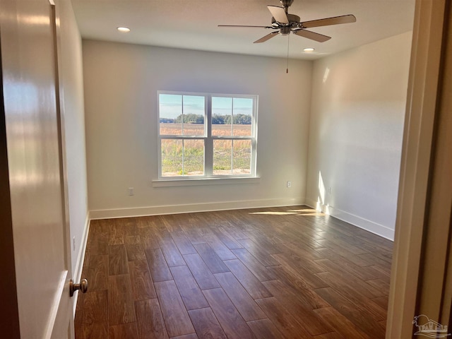 4420 Russell Elliott Rd, Jay, FL 32565 - spare room with dark wood finished floors, a ceiling fan, baseboards, and recessed lighting