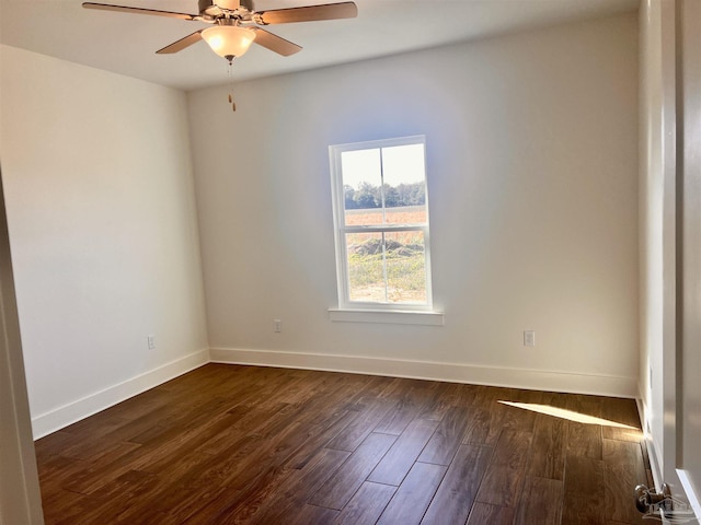 4420 Russell Elliott Rd, Jay, FL 32565 - unfurnished room featuring ceiling fan, dark wood finished floors, and baseboards
