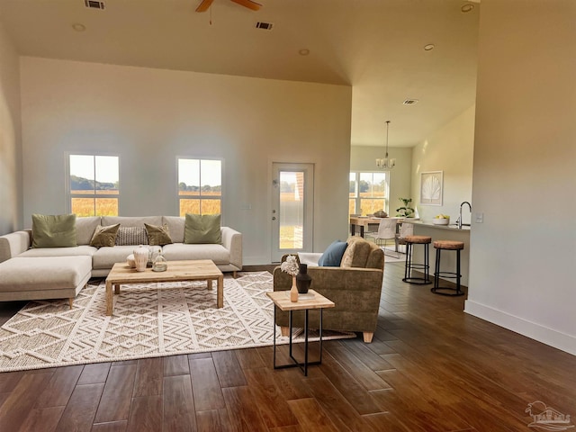 4420 Russell Elliott Rd, Jay, FL 32565 - living area featuring dark wood-style floors, ceiling fan, and baseboards