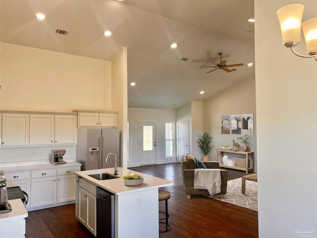 4420 Russell Elliott Rd, Jay, FL 32565 - kitchen with a sink, fridge with ice dispenser, high vaulted ceiling, open floor plan, and ceiling fan
